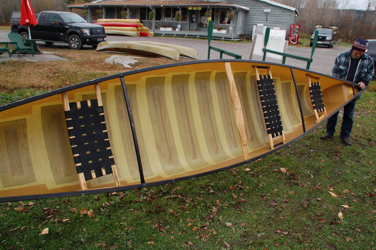 Killarney Outfitters used kevlar canoes and sea kayaks for sale